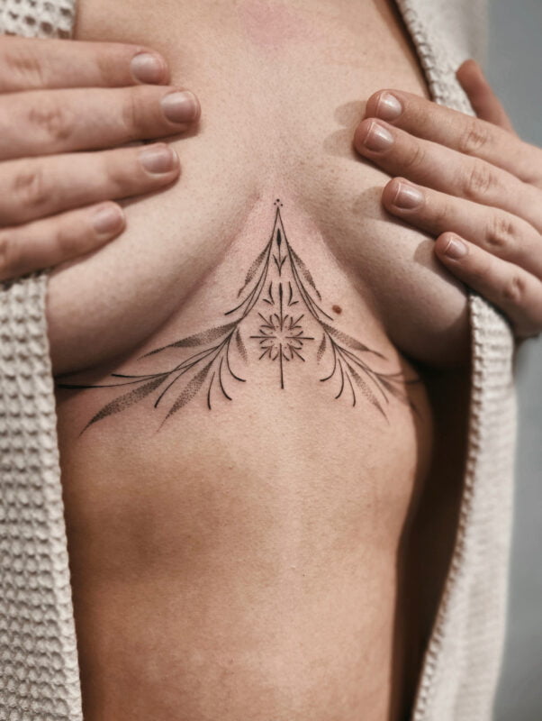 Underboob fineline tattoo